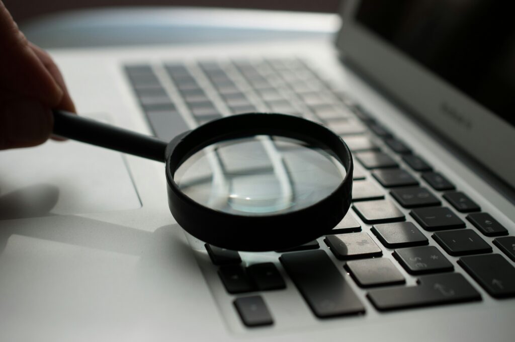 Magnifying glass on a computer keyboard